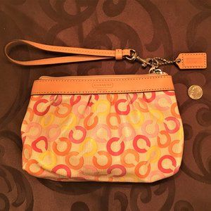 COACH wristlet: bright, fun, trendy and practical!